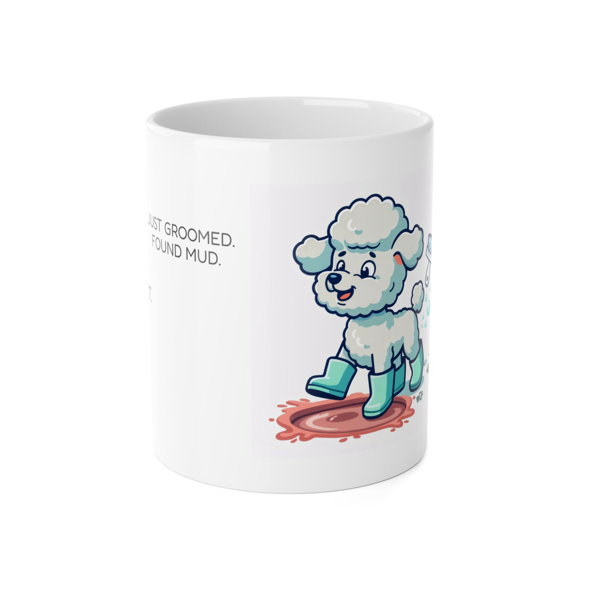 White ceramic mug with a playful poodle in rain boots and the phrase ‘Just Groomed. Found Mud.’
